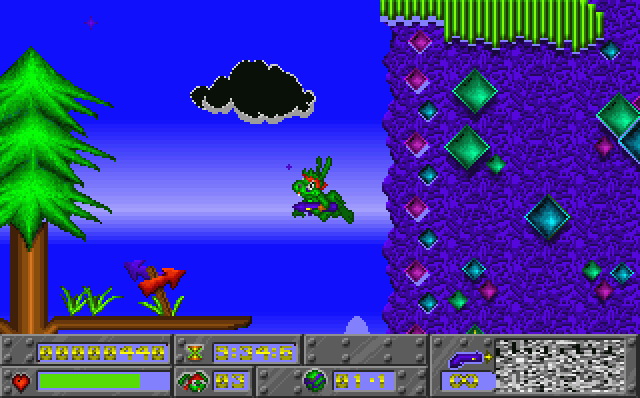 Jazz Jackrabbit running through a vibrant colorful level with floating items