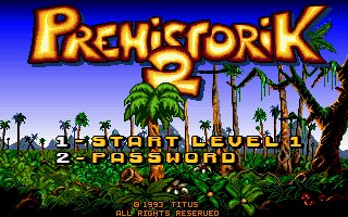 A caveman hitting enemies with a club in a vibrant platformer level